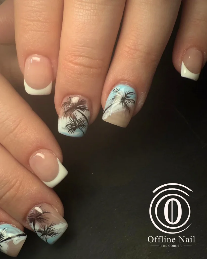 Black and white botanical nails with French tips